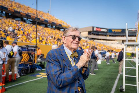 President Gee clapping at Mountaineer Field