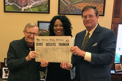 Holding Dewey Defeats Truman newspaper