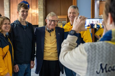 President Gee posing for picture with a prospective student and family