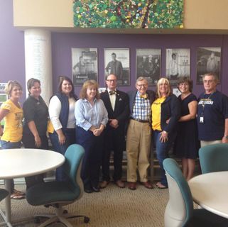 President Gee with faculty and staff