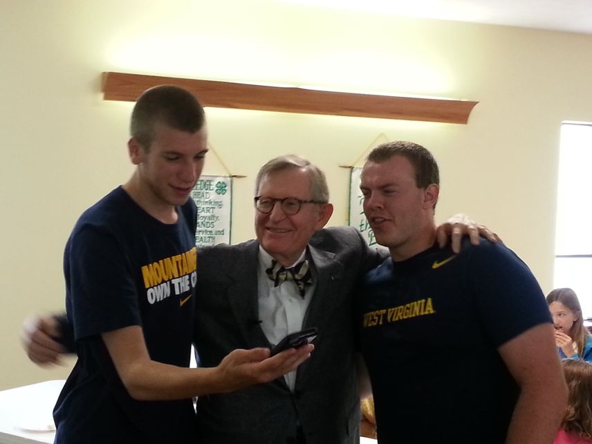 President Gee with WVU students Jesse Lackey and Joshua Briggs